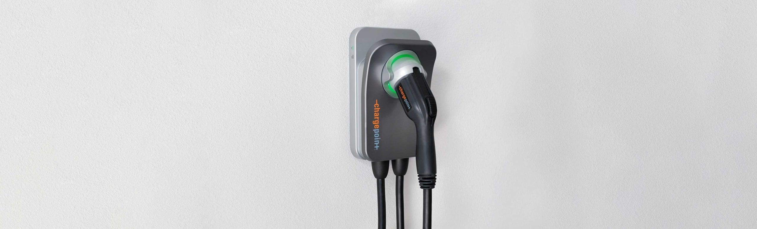 An image of a green color electrical vehicle charger